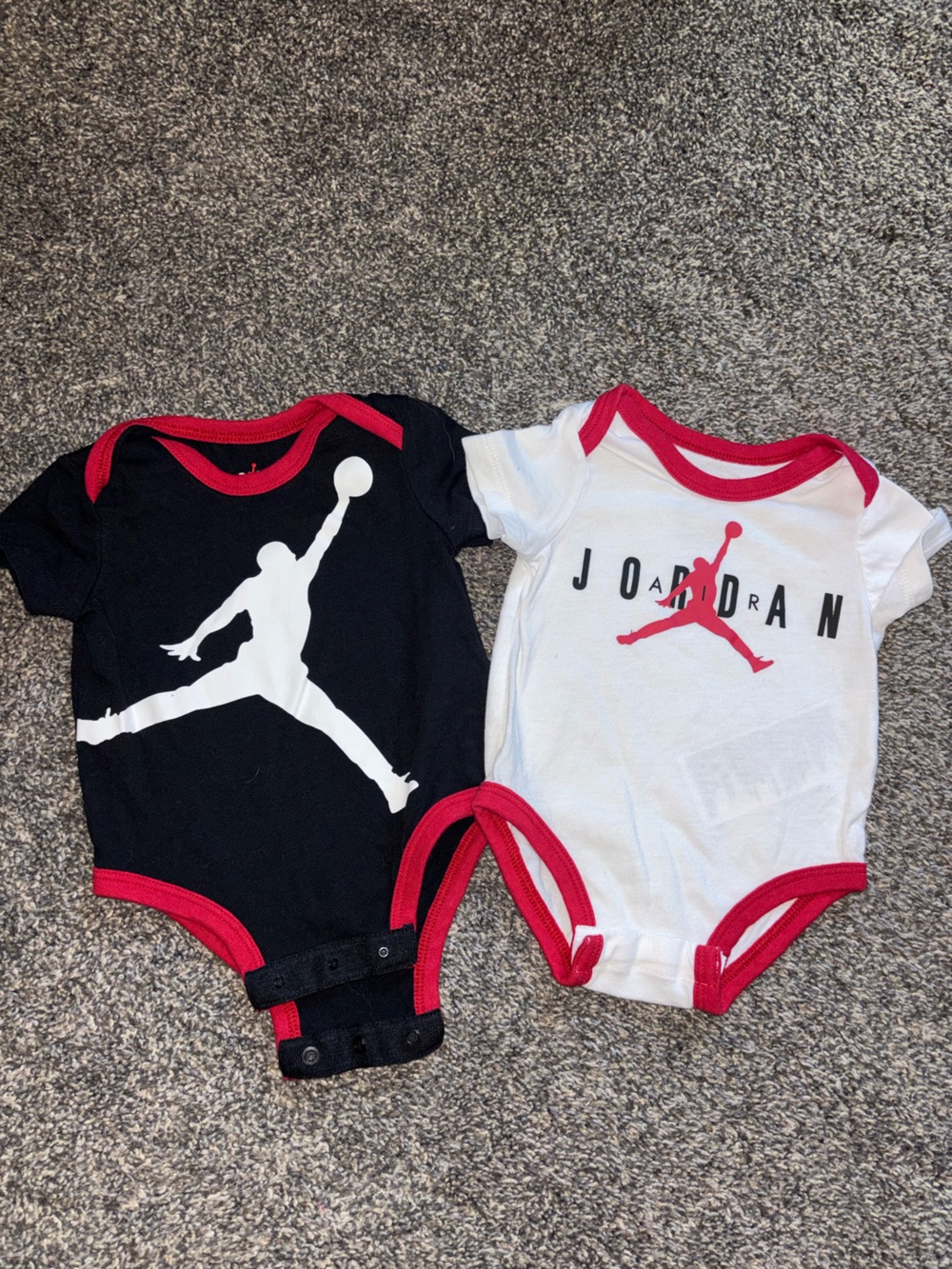 Jordan Black Infant Bodysuits with Red Jumpman and Trim